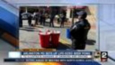 Arlington County Police sets up beer pong to raise awareness on drunk driving