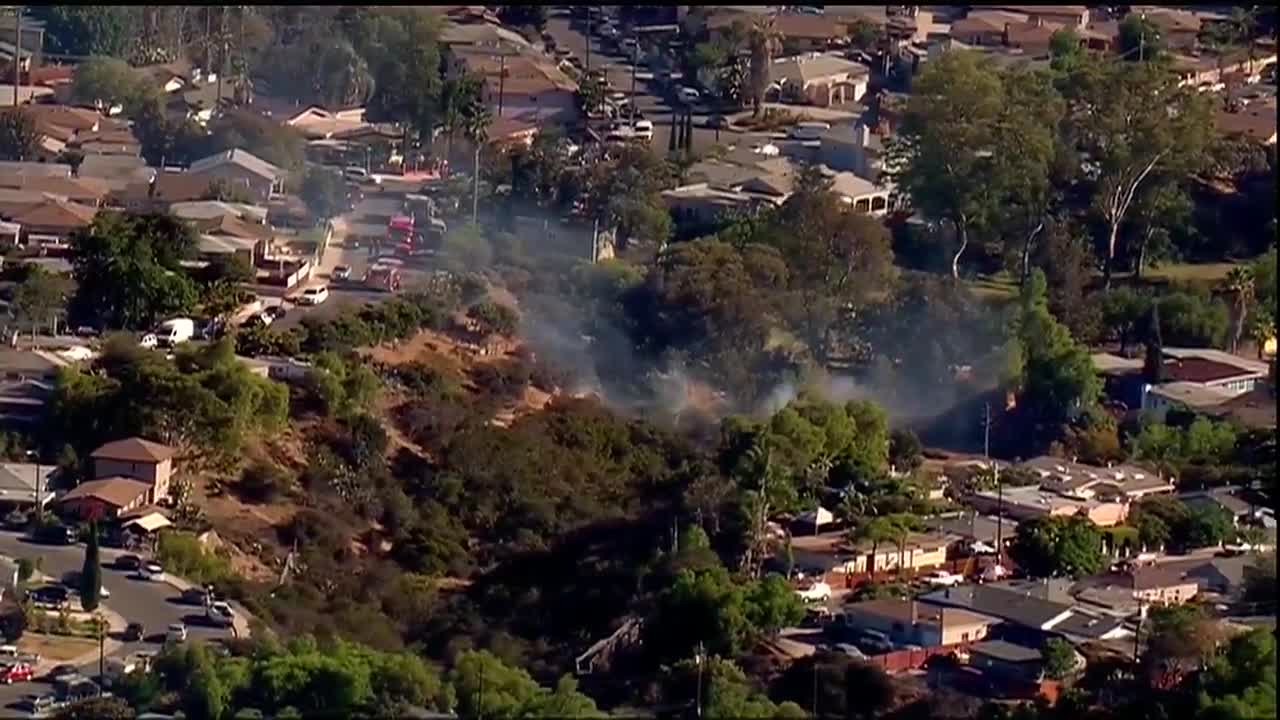 Fire burns dangerously close to homes in canyon