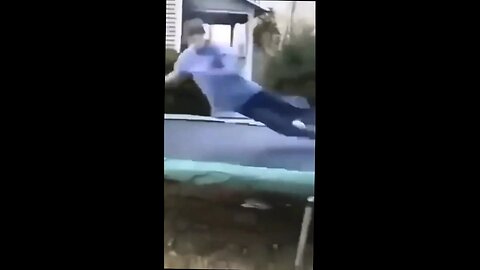 dude jumps on skateboard on a tramp and sends it through a window.