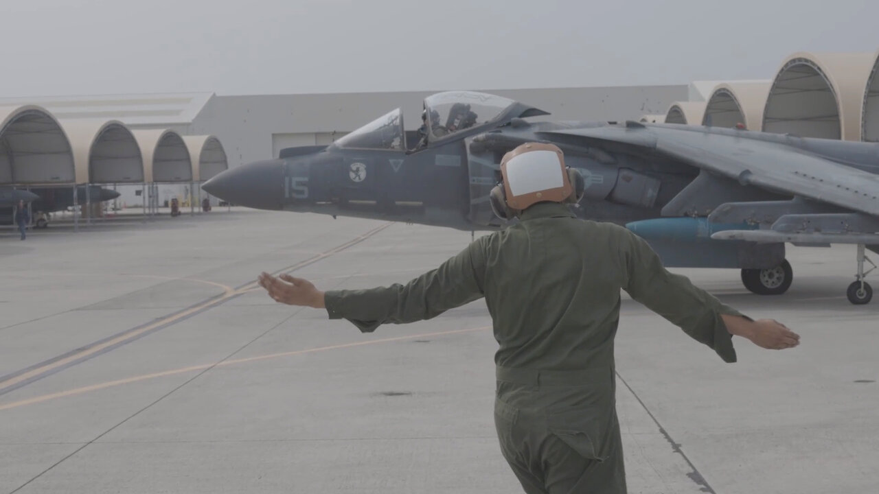 U.S. Marines with Marine Aircraft Group 14 maintain AV-8B Harrier II aircraft