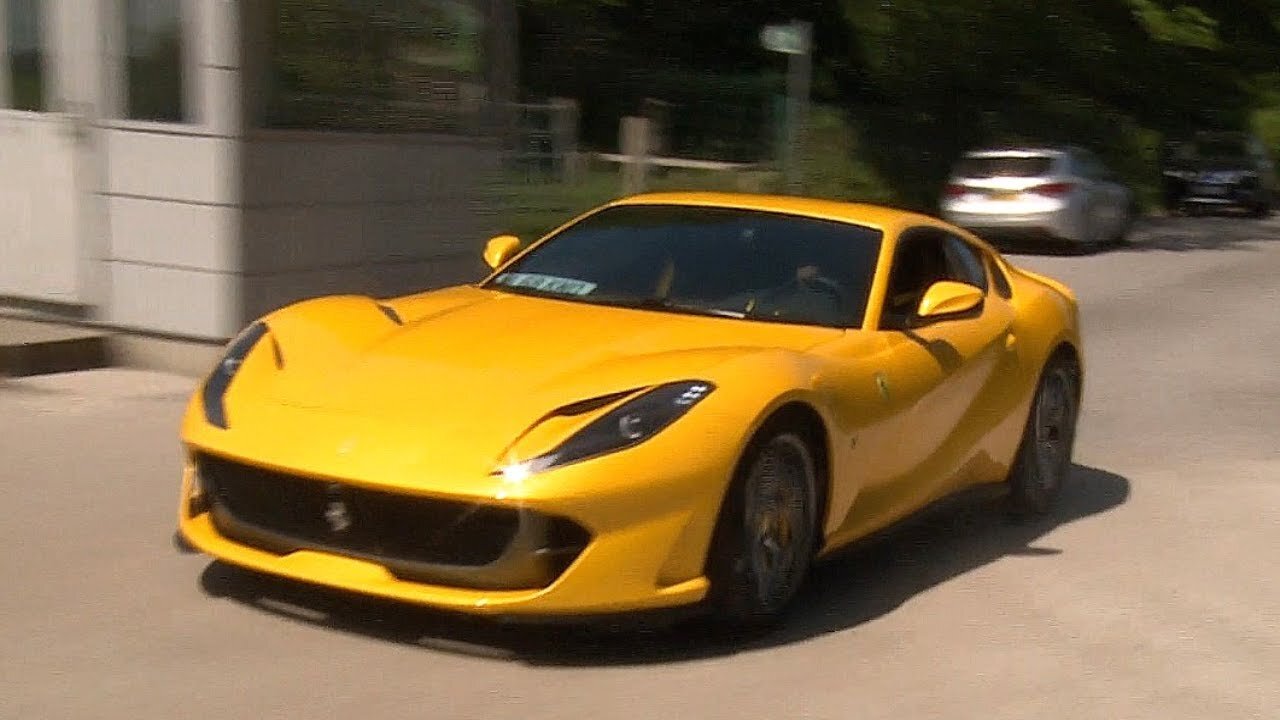 Paul Pogba arrives at Manchester United's first training session in his Ferrari 812.