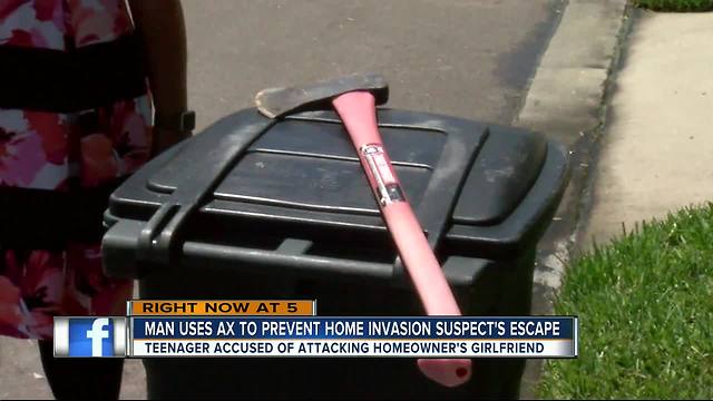 Axe-wielding boyfriend saves girlfriend from home invasion in Pinellas Park