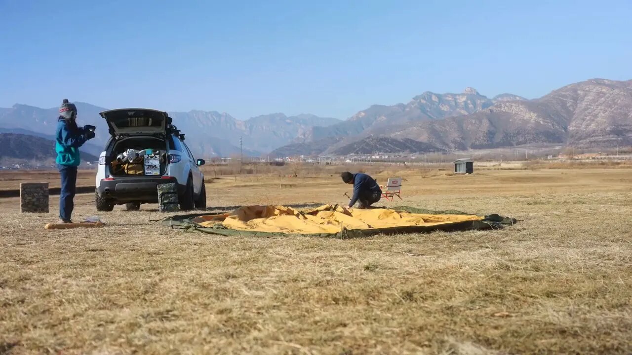 Cooking hot pot in a tent