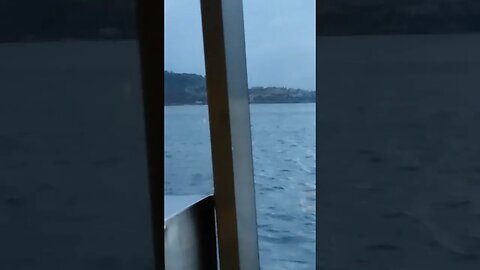 Some dude on his Kayak on the harbour in the morning.