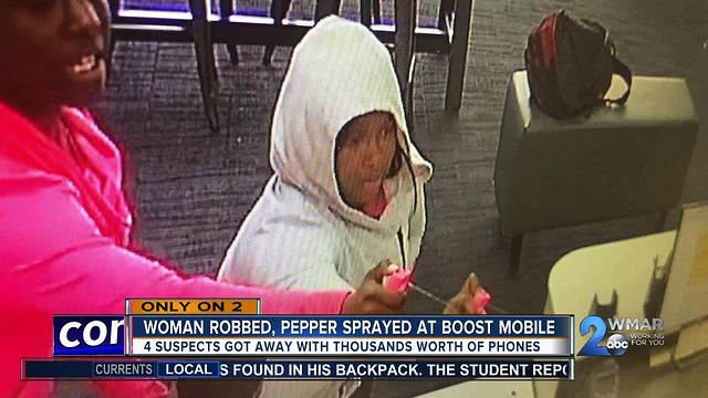 Robbed and pepper sprayed while working the counter at a cell phone store