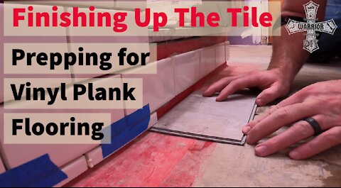 Finishing up the tile-vinyl plank flooring with tile wall DIY