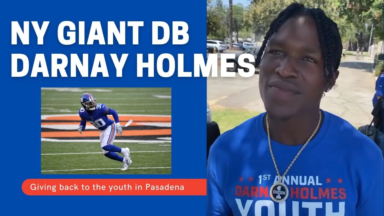 NFL Player Darnay Holmes giving back to the community.