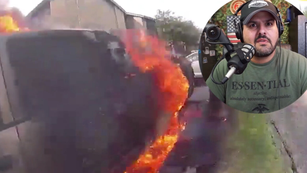 Watch COPS Pull a Guy out of a Burning Truck!