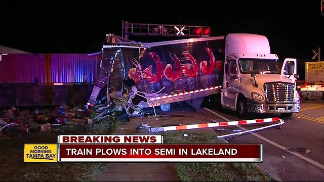 Train crashes into tractor-trailer stalled on tracks in Lakeland