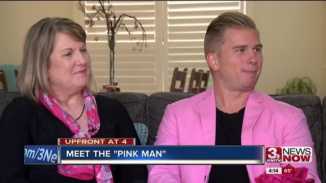 Man wears pink to support mother with breast cacner