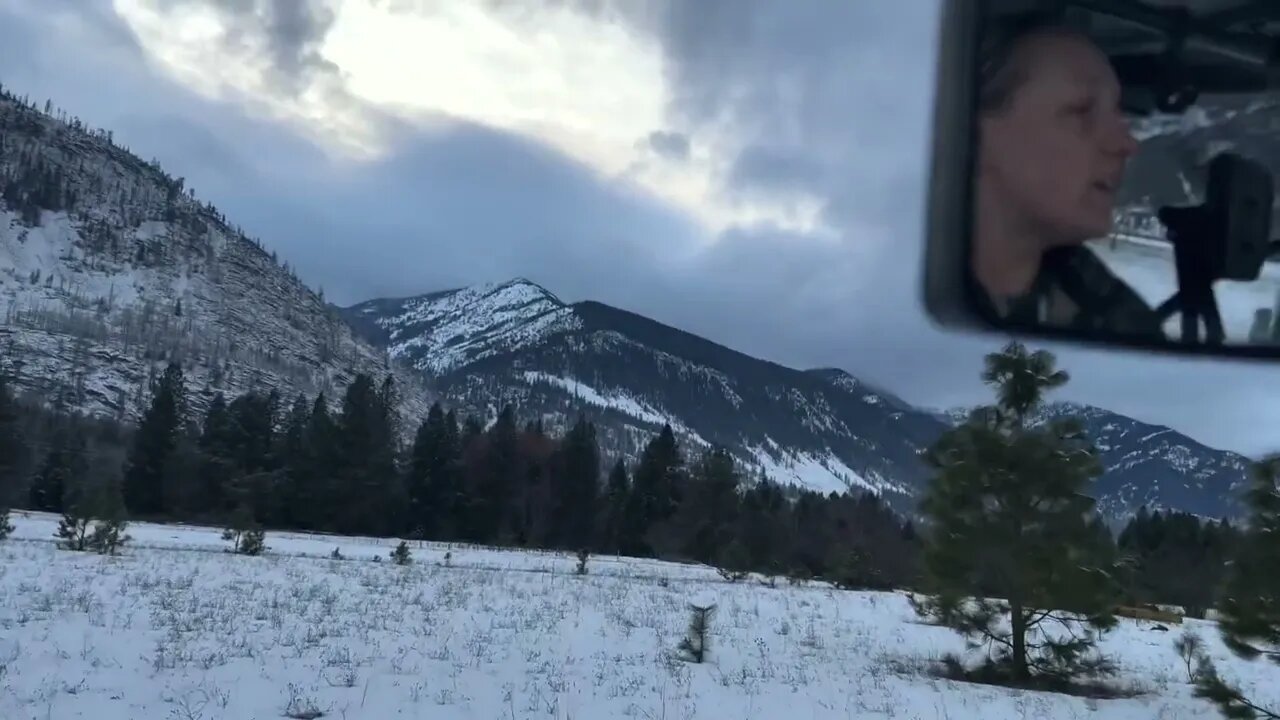 Sledding behind ATV on the Front of our Hunting Property