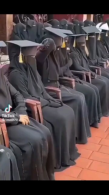 Can you find your daughter in this graduation ceremony? Hint: I think she's wearing black...