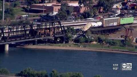 Train derails, causing fire and partial Tempe Town Lake bridge collapse