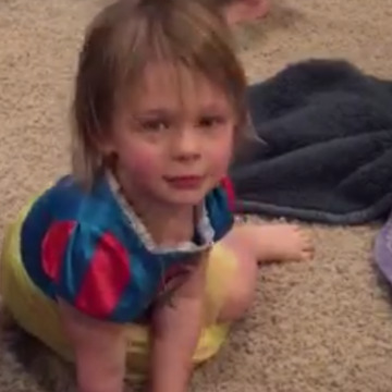 A Cute Girl Playing With Laser