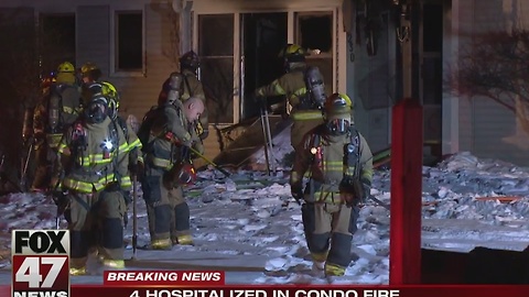 Four hospitalized after condo fire in Delta Township