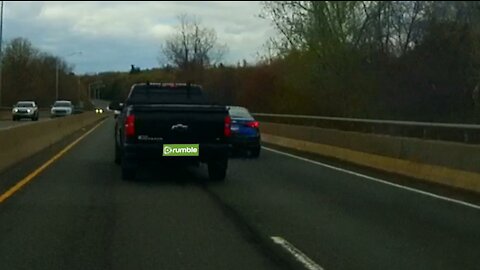 Rushing truck dangerously changes lanes