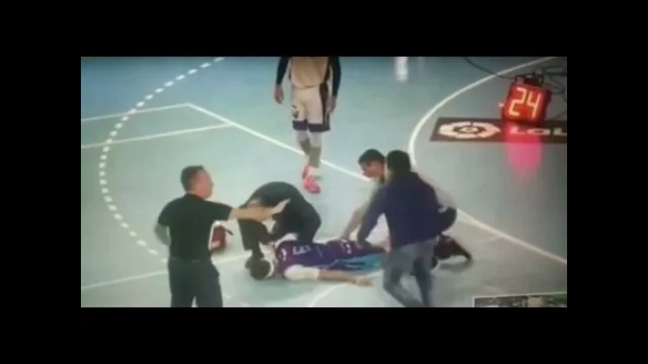 Another player collapsing on the basketball court...