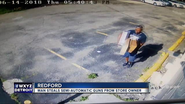 Man caught on surveillance stealing 2 semi-automatic guns