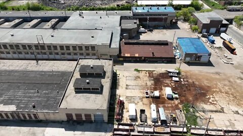 Powerful blast launches car 100 feet onto second-story roof