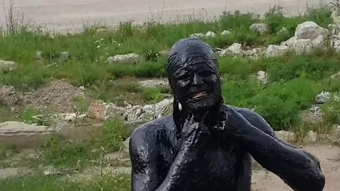 Guy jumps into pool of motor oil, immediately regrets it 