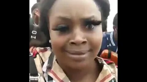 Lady seen struggling with her eyelashes during a boat ride