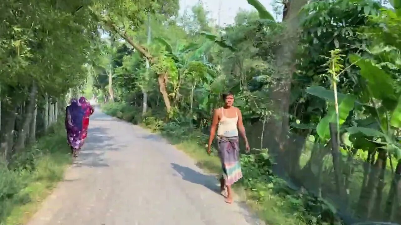 Nature Lover with Bike in Village Road