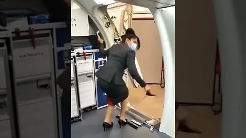 Airhostess Opening And Closing Flight Door.