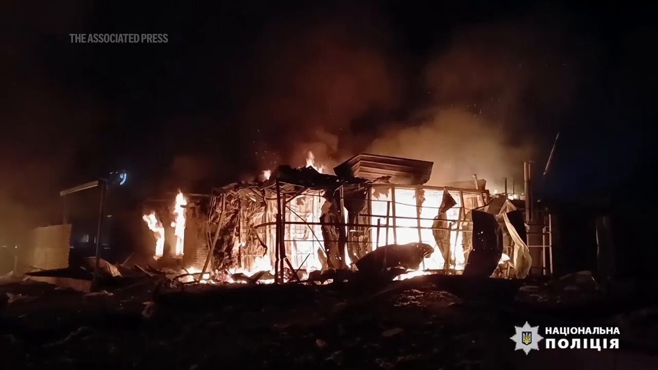 Cars and buildings ablaze amid Russia's latest attack on Ukraine's Zaporizhzhia