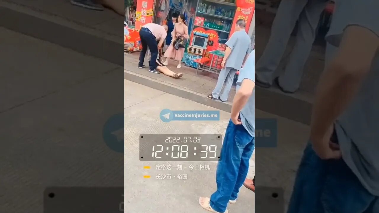 A woman fell to the ground and convulsed