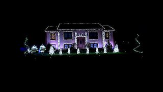 Christmas light display set to epic dance mix