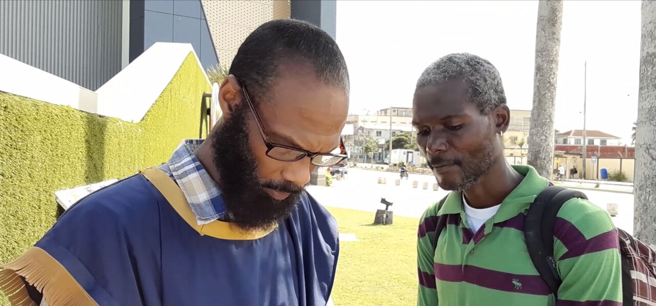 "BELIZEAN" FATHER PRAYS FOR HEALING