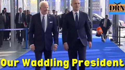 Joe Biden Can Barely Walk – Waddles Through the Halls Smiling Like an Idiot at NATO Meetings