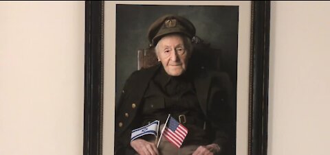 Veteran stories told through portrait gallery inside Henderson City Hall