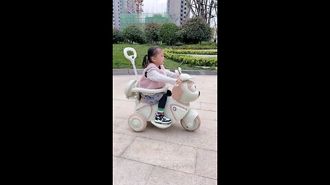 cute girl riding in battery bike