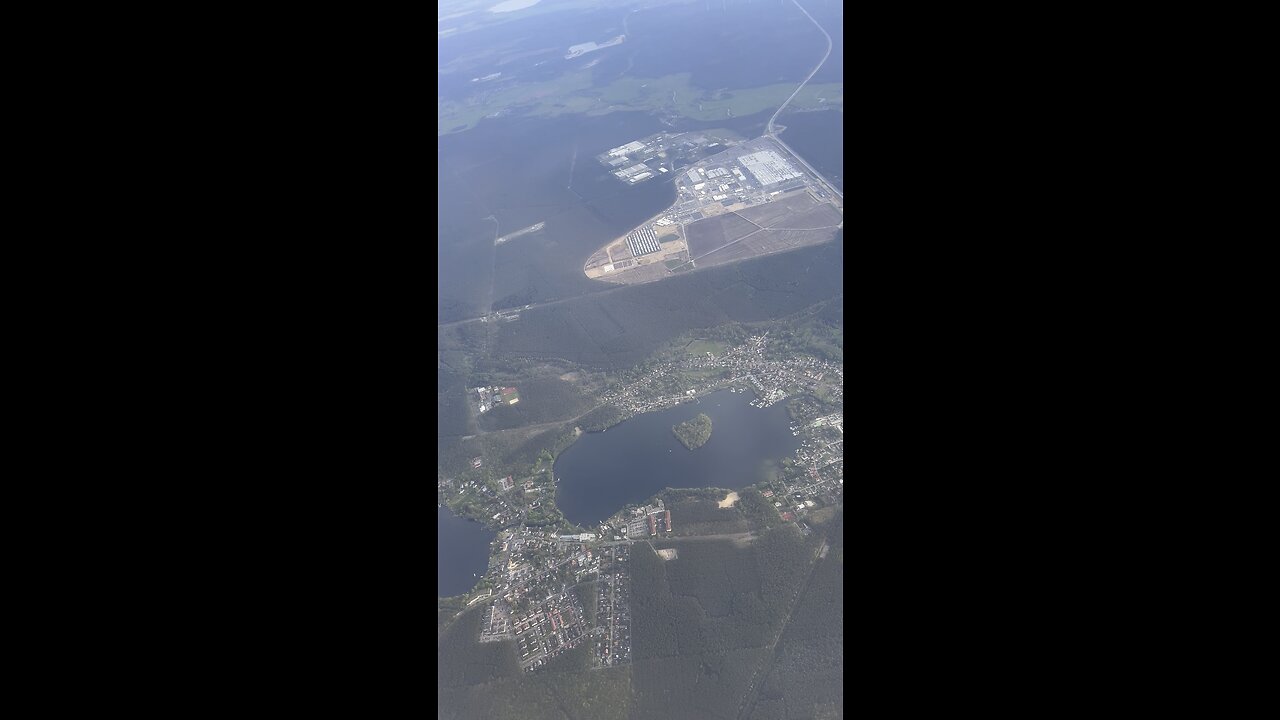 Berlin Soaring: A Captivating Aerial View of the Lakes and Cityscape