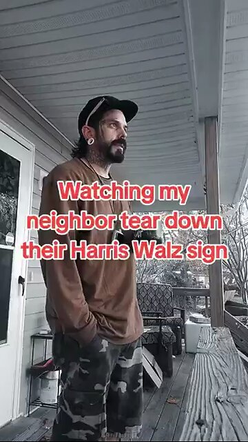 Watching Neighbour takes off Harris sign