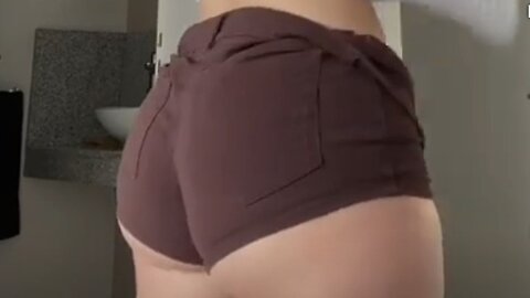 Tiny brown shorts try on