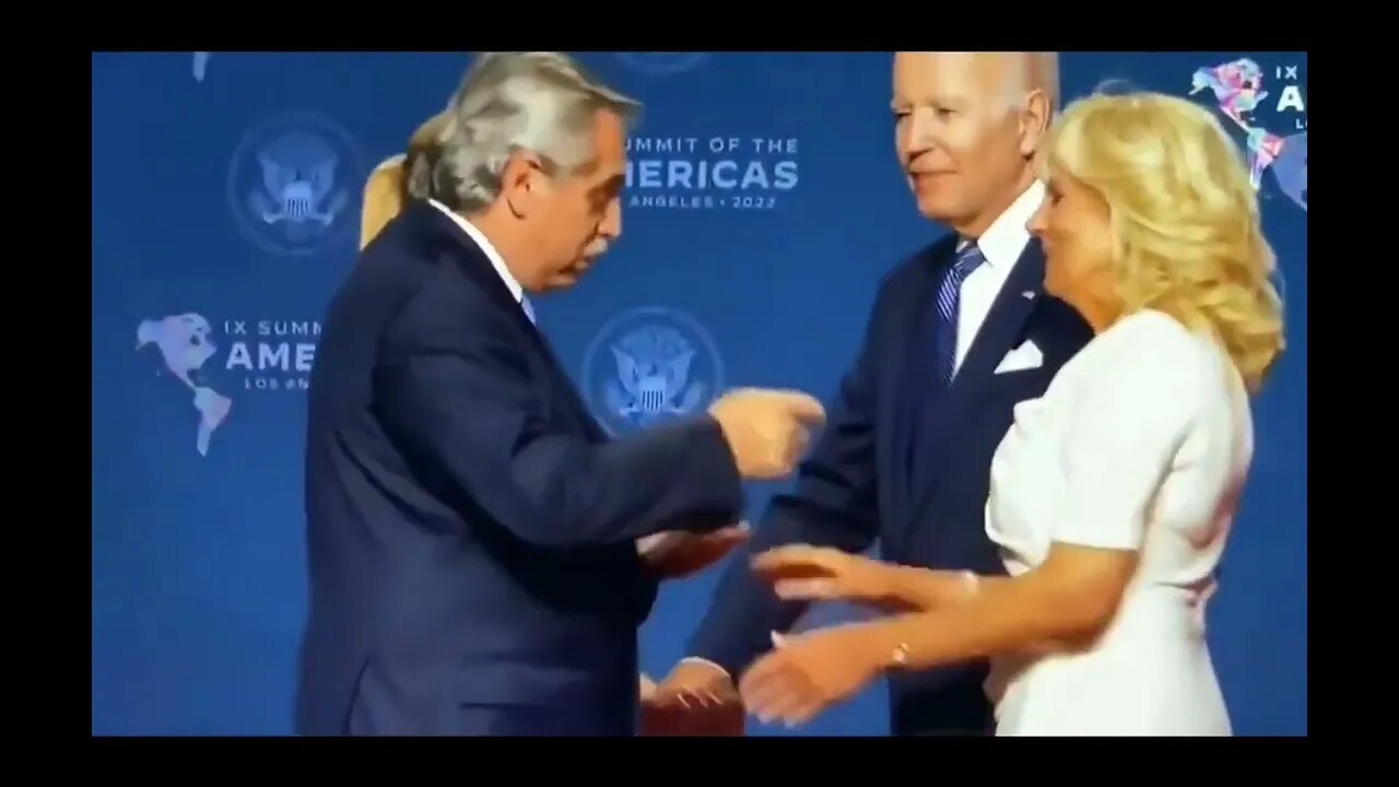 Watch Joe Biden grab the President of Argentina's wife's hand and not let go.