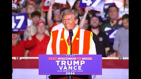 Trump wears orange vest during campaign speech in battleground Wisconsin
