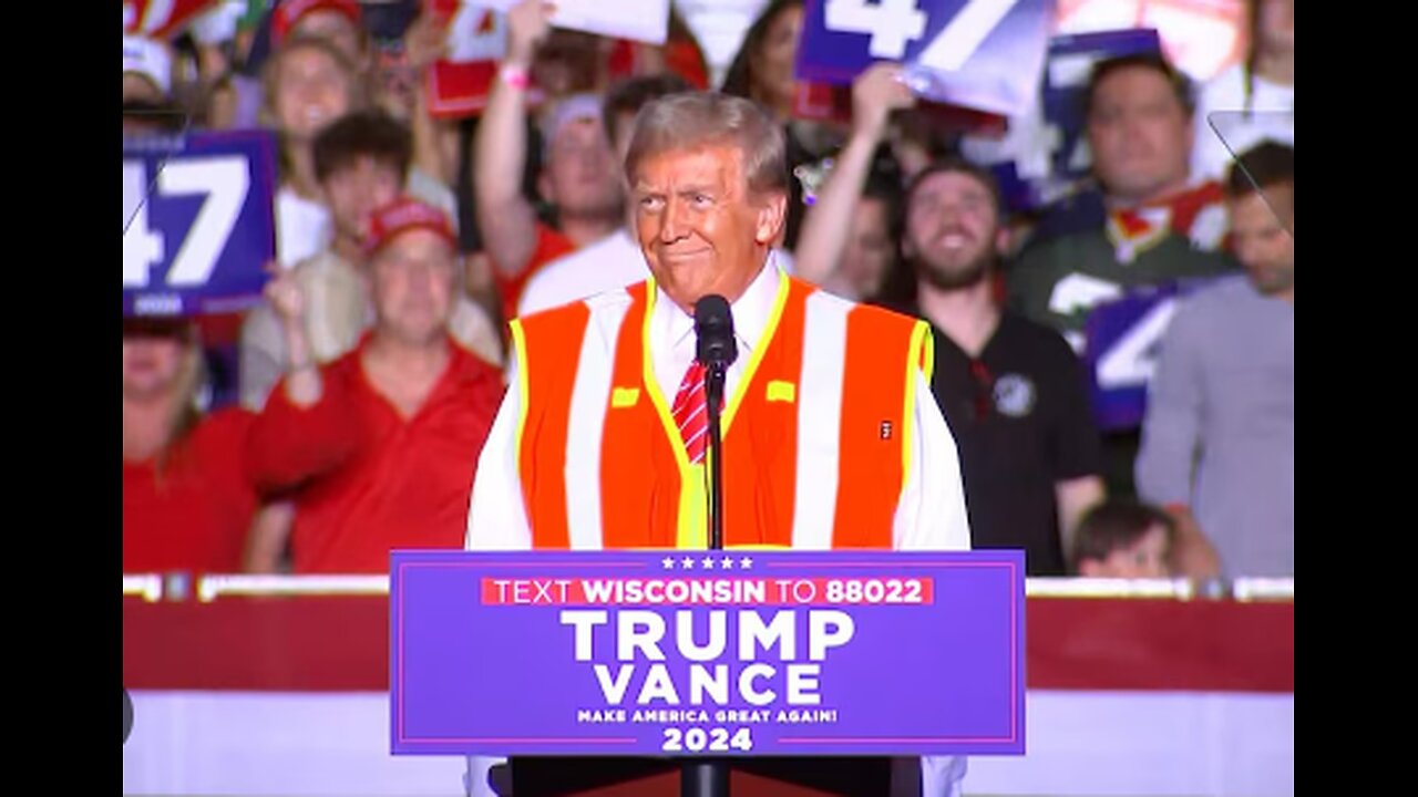 Trump wears orange vest during campaign speech in battleground Wisconsin