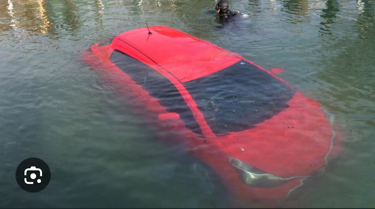 "Death-Defying Stunt: Car Launches into Water at High Speed!"