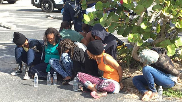 Migrants detained on Jupiter Island; the group included a pregnant woman and two children