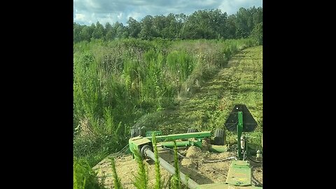 Cutting Weeds with a 15 Foot Rotary Cutter