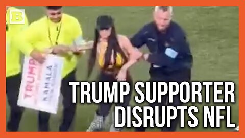 Woman with Pro-Trump Sign Bolts Across Football Field During Steelers vs Jets Game