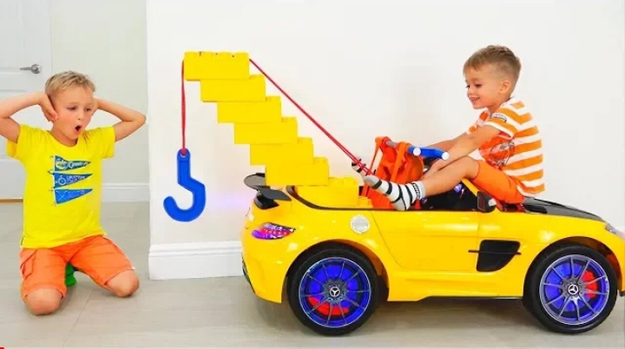 Vlad and Nikita play with Toy Tow Truck for children