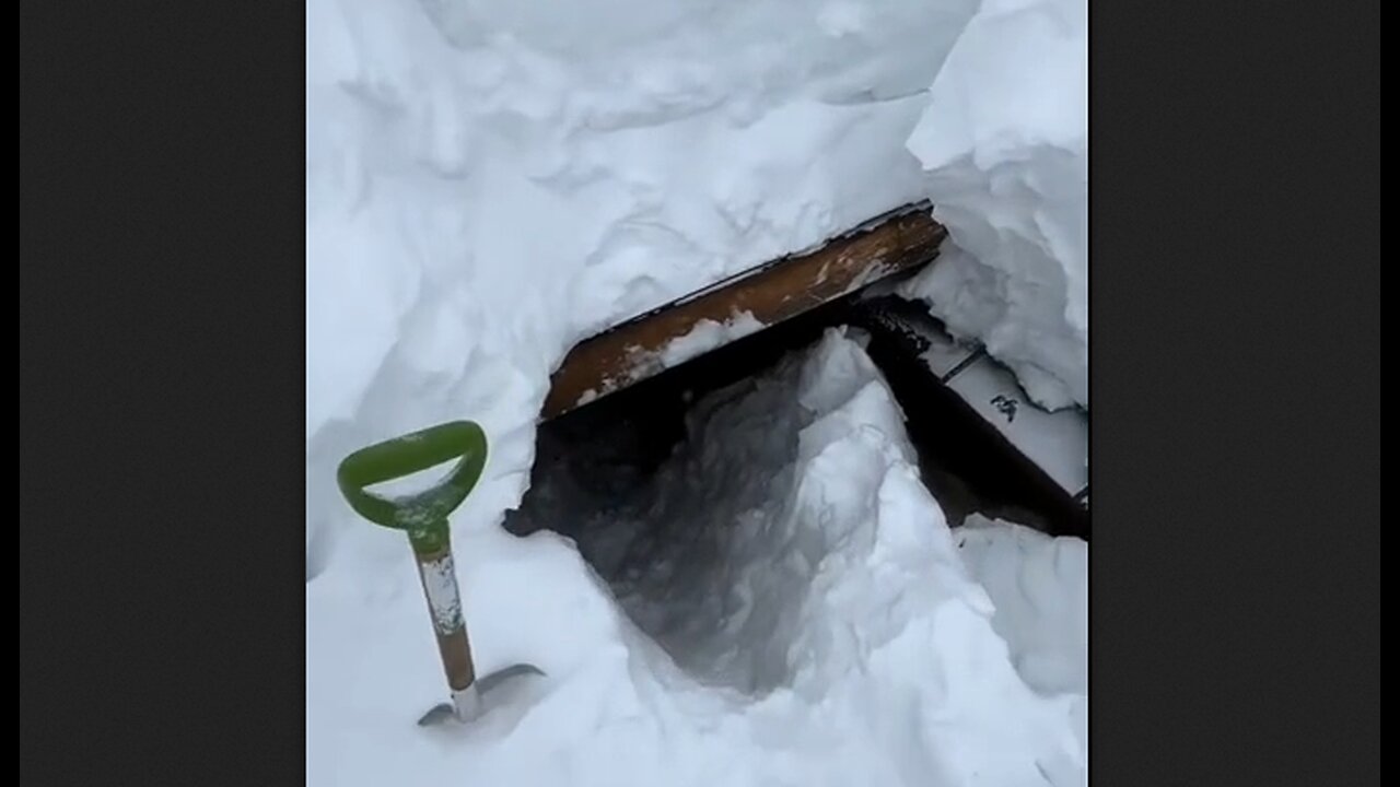 Cabin Buried By Snow
