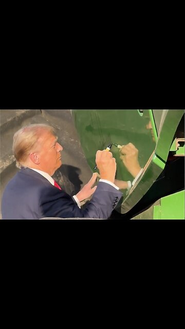 Trump Signs John Deere Combine