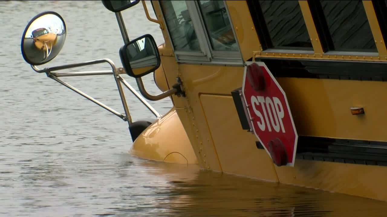 Video: School bus stuck due to floods in Elm Grove