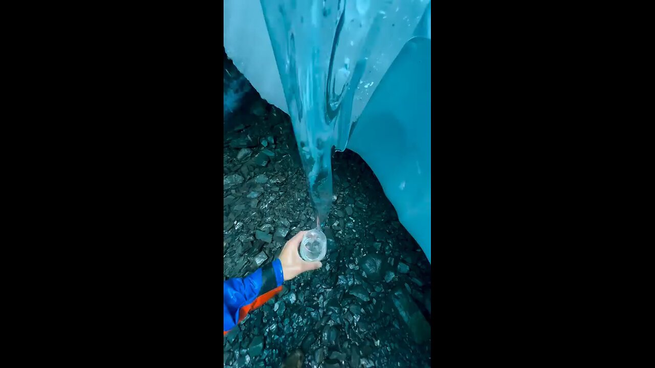 "Next Level Hydration Inside An Alaska Glacier Cave With a Tunnel Through The Roof Follow For More