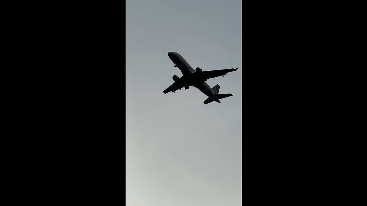 Passenger Airplane landing low flying